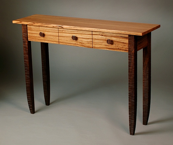 Three drawer custom hall table with carved walnut legs handmade by Kyle Dallman