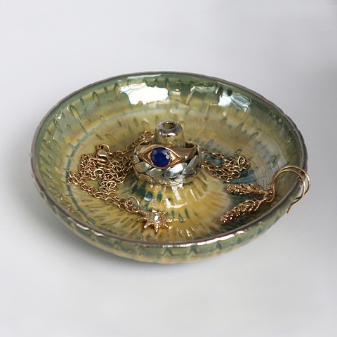 Yellow & teal marbled & carved ring holder with assorted gold jewelry