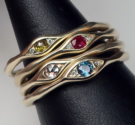 jeweled eye rings, 14 karat gold, diamond, ruby, blue topaz