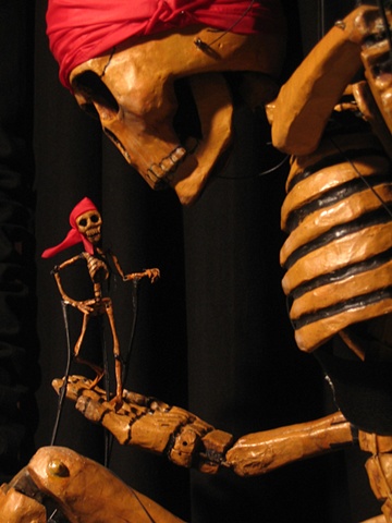 Skeleton Body Puppet holding little Skeleton Rod Puppet