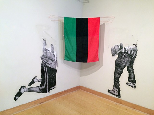 wheat-paste drawing installation with Pan-african flag by Antoine Williams 