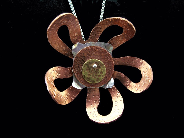 Kinetic copper, silver and brass