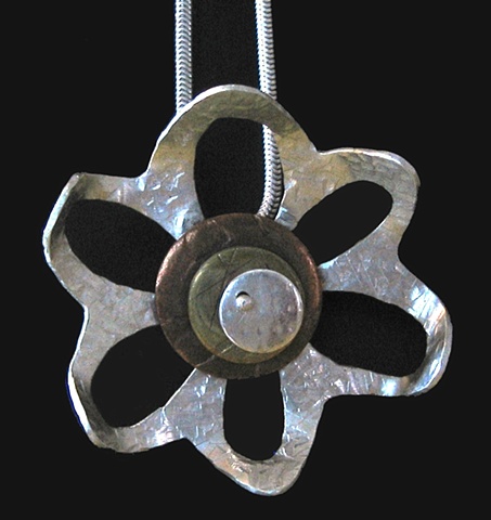 Kinetic silver, copper and brass