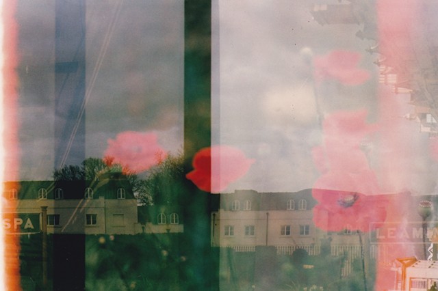 A lo-fi multiple exposure film photo of poppies, flowers, Oxford, and Leamington Spa, England.  Sky, architecture, burn, and soft colours.