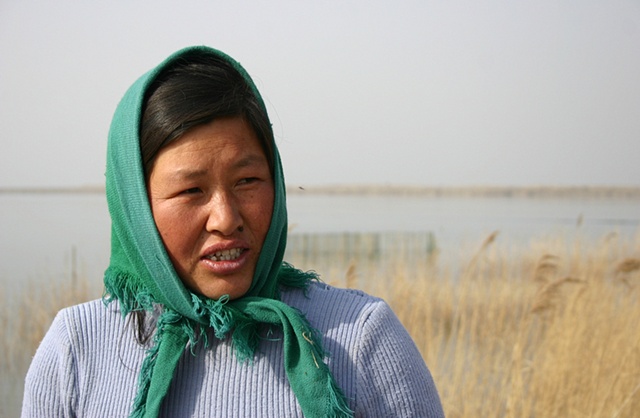 Fisherwoman, Tuanbo Lake