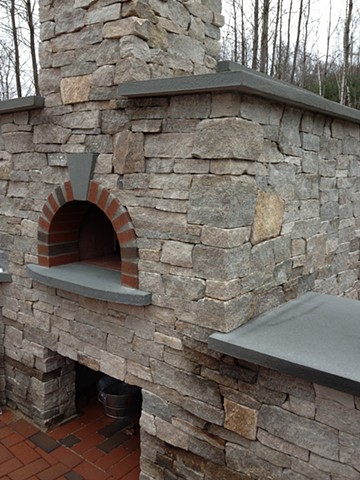 Natural stone and brick outdoor pizza flatbread oven