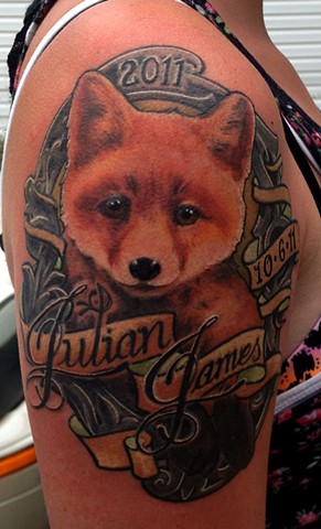 fox tattoo with ornamental frame by chris lowe of naked art tattoo