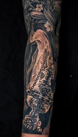 details of religious tattoo by chris lowe of naked art tattoos
