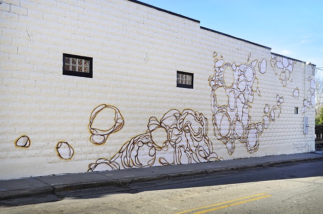Side angle shot of the Biscuit Head mural, "Movement Pattern"