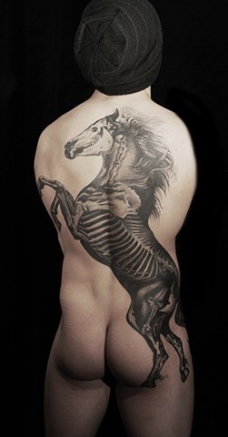 Black and Gray Backpiece Tattoo of a Dark Horse
