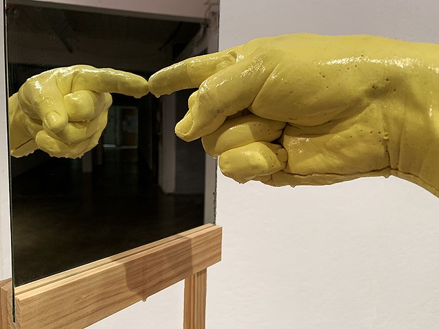finger pointing, brian zimmerman, brain zimmerman, artist contemporary art cast hands, plaster hands, rickity wood, structure, yellow, pointing blame mirror, sculpture 