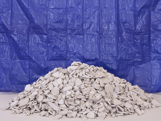 photograph of sculpture of drywall rubble pile by Rena Leinberger