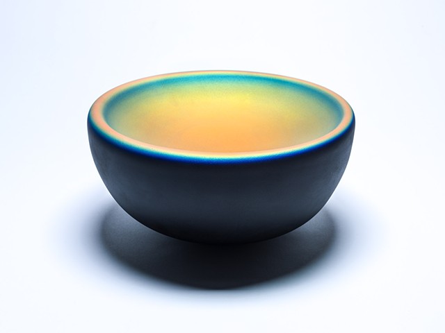 decorative handblown glass bowl with iridescent coating