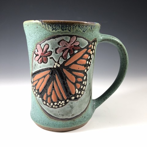 Butterfly mug with flowers