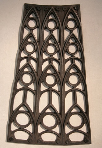 Cast iron wall sculpture with Gothic motif By Vaughn Randall