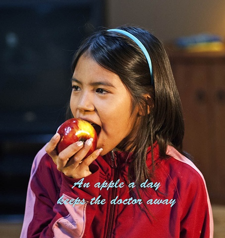 Girl eating apple, health benefits