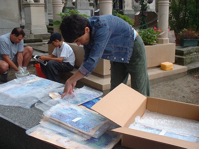 Unpacking the sections of the work for installation in Paris.
