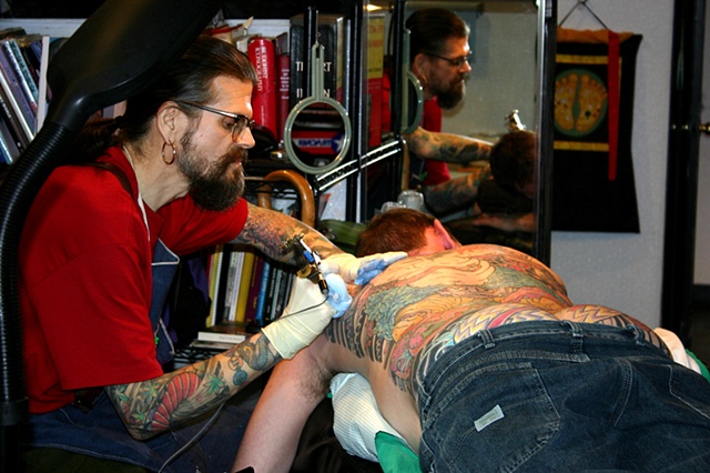 D.T. tattooing a killer back piece