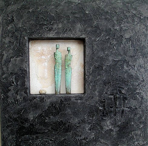 Two Bronze figures with stone