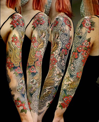 A traditional Japanese full sleeve featuring a fudge and sakura "cherry blossoms"