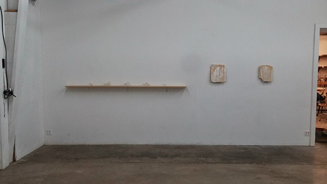 Installation view: Untitled (Transparent Iteration),  Untitled (Self-portrait in the form of Stone Tablets)