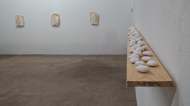 Installation view: Untitled (Prototype for Self-portrait in the Form of White River Rocks),  Untitled (Self-portrait in the form of Stone Tablets)