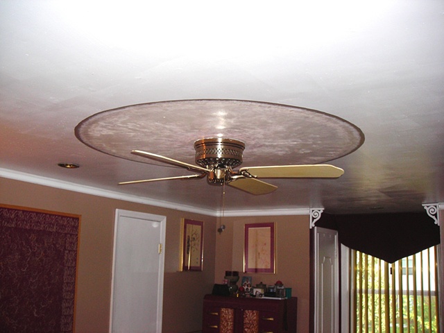 Painting above ceiling fan mural