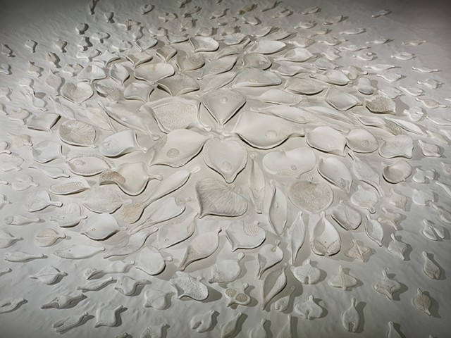 Presence (absorb) detail | painted ceramic on sand | floor installation, dimensions vary