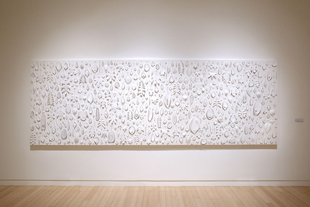 Biophilia (leaves) II | porcelain, graphite, pigment, sewing needles, wood panel | 60 x 180 x 2.5 inches