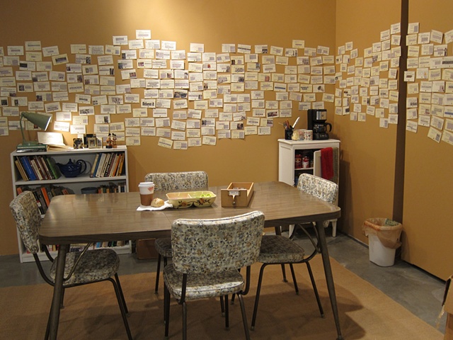 Interactive installation using library catalogue cards and newspaper clippings