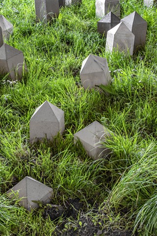 an installation of obelisk points in a field