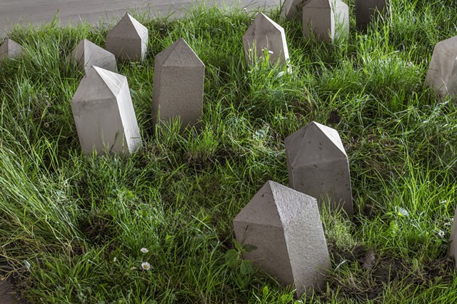 an installation of obelisk points in a field