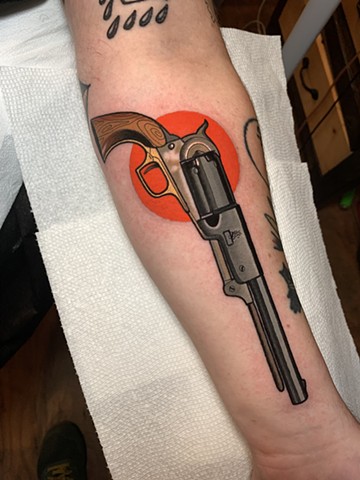 revolver gun tattoo by tattoo artist dave wah at stay humble tattoo company in baltimore maryland the best tattoo shop in baltimore maryland