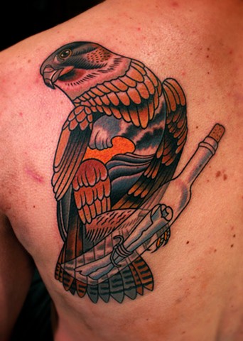 falcon tattoo by dave wah at stay humble tattoo company in baltimore maryland