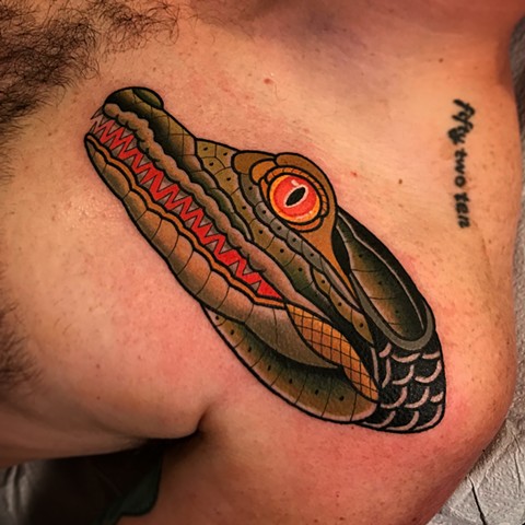 crocodile tattoo by dave wah at stay humble tattoo company in baltimore maryland the best tattoo shop and artist in baltimore maryland