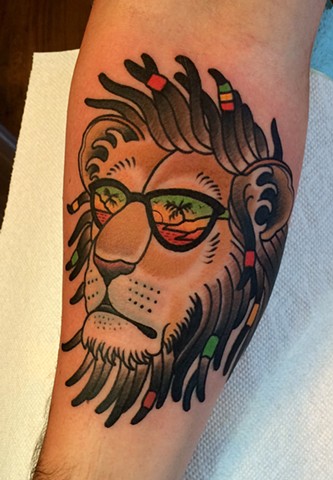 rasta Lion tattoo by dave wah at stay humble tattoo company in baltimore maryland the best tattoo shop in baltimore maryland