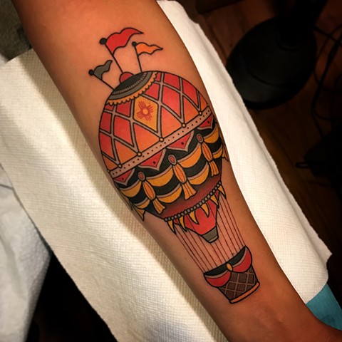 hot air ballon tattoo by dave wah at stay humble tattoo company in baltimore maryland the best tattoo shop and artist in baltimore maryland