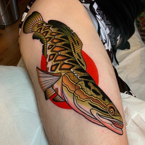 northern snakehead tattoo by tattoo artist dave wah at stay humble tattoo company in baltimore maryland the best tattoo shop in baltimore maryland