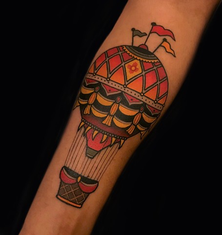 hot air balloon tattoo by dave wah at stay humble tattoo company in baltimore maryland the best tattoo shop and artist in baltimore maryland