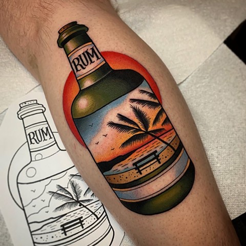 rum bottle tattoo by tattoo artist dave wah at stay humble tattoo company in baltimore maryland the best tattoo shop in baltimore maryland