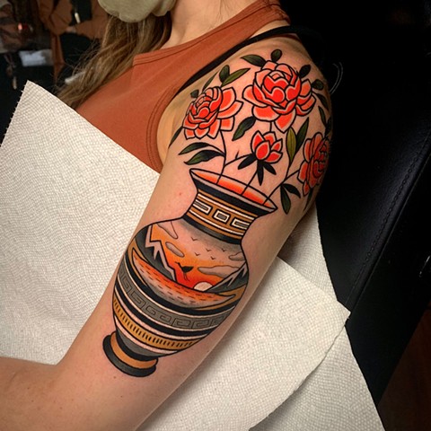 traditional flower vase tattoo by tattoo artist dave wah at stay humble tattoo company in baltimore maryland the best tattoo shop in baltimore maryland