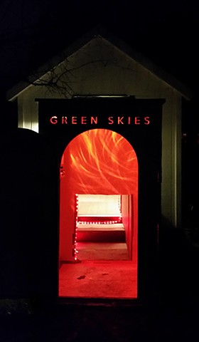 Green Skies- Exterior View at Night