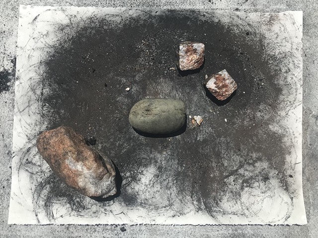 performative process from "Witness 4" 
April 2020 
performative drawing with rocks, tea, and charcoal