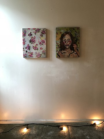 two paintings with lights