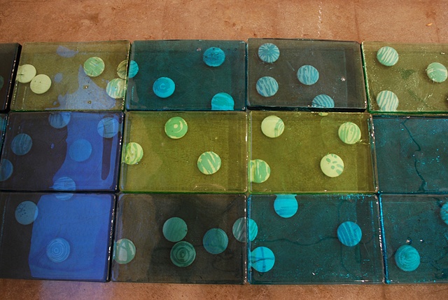 Video projectio with glass tiles and ceramic elements
