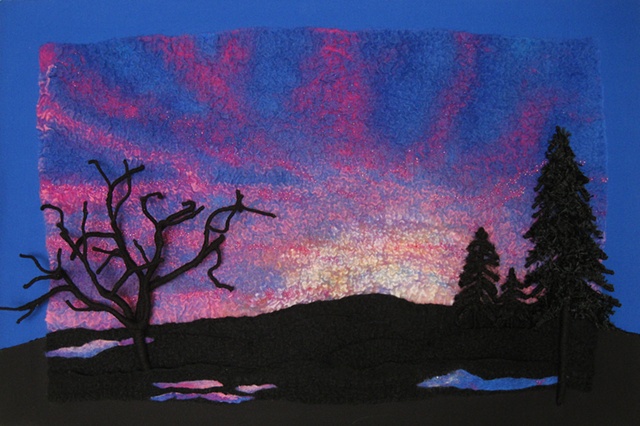"Red Sky at Night" by Linda Thiemann is a Nuno felted piece of contemporary fiber art.
