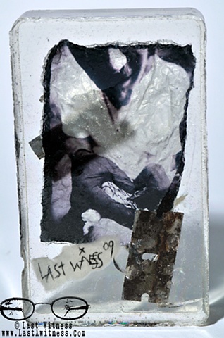 photo emulsion suspended in resin with rusted single edge razor blades