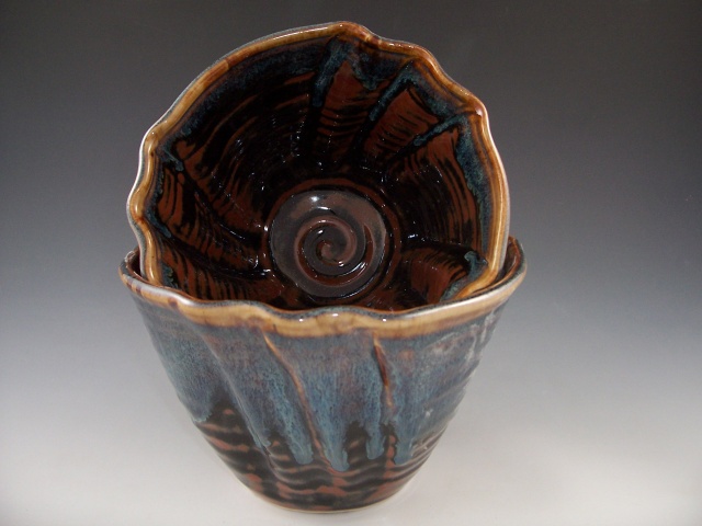 Altered Nesting Bowls in Temmoku with Rutile Rim