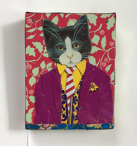 Tin artwork of a Tuxedo Cat in a suit and tie