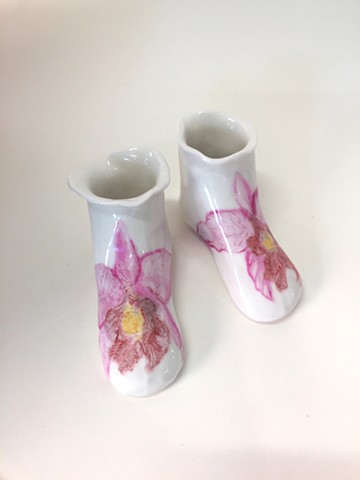 pink orchid hand painted on porcelain shoe.